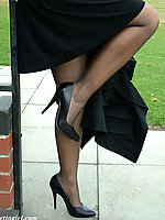 Leggy young lady in stilettos and stockings