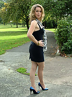 Adorable bitch in high heels and pantyhose