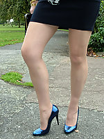 Leggy babe in high heels and pantyhose