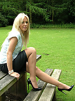 Leggy milf in pumps and black stockings